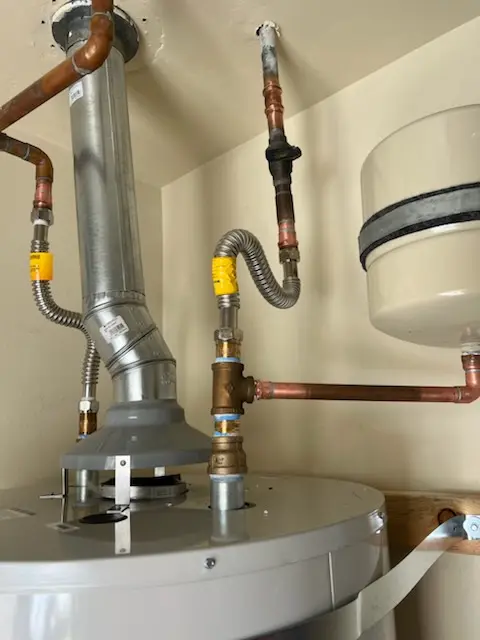 Water heater installation and plumbing repair in Bedford